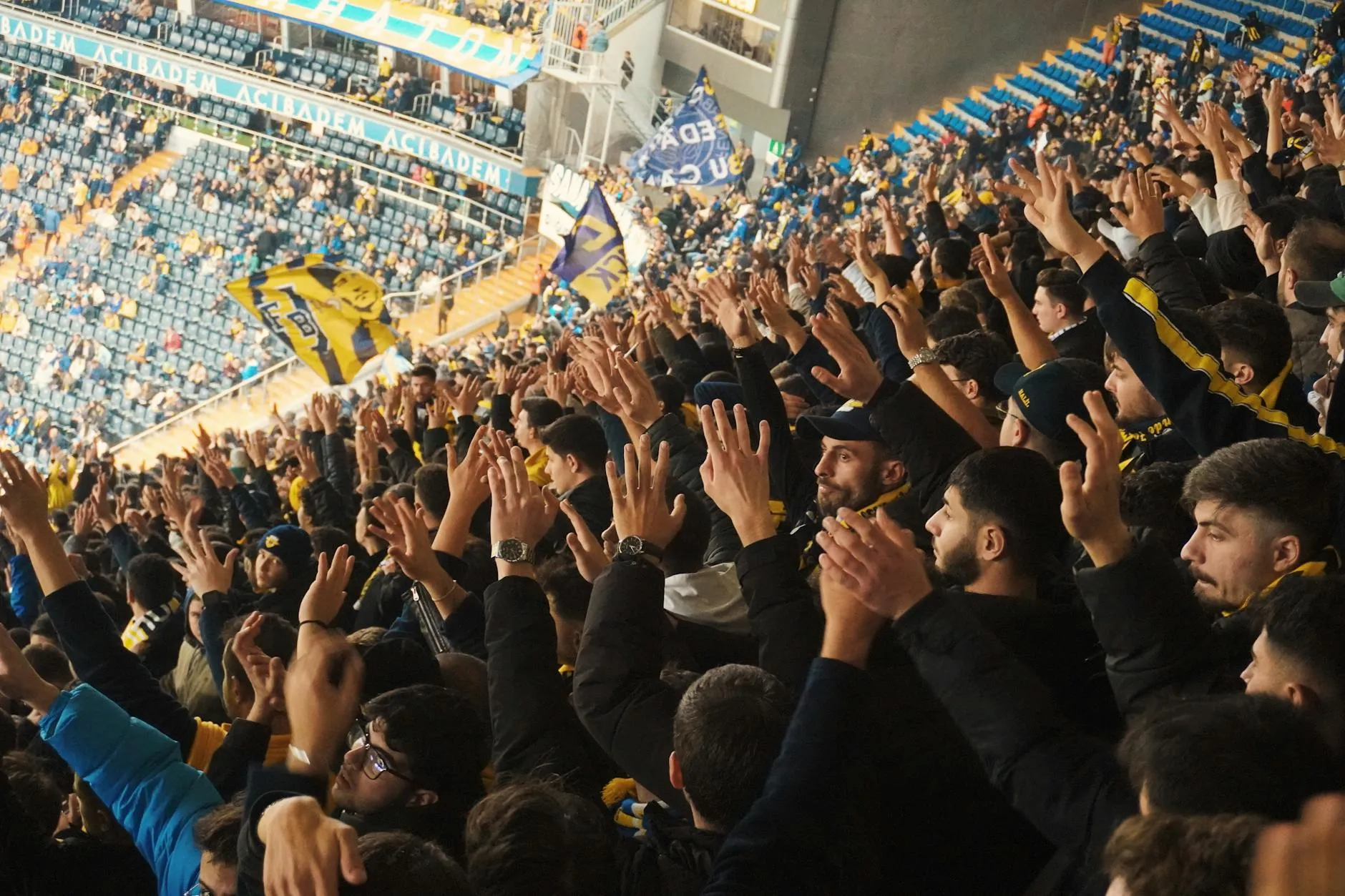 Supporters raise their arms in celebration as Mexico beat Ecuador 2-0 in the World Cup 2026 Round of 32 at Mexico City Stadium on June 30