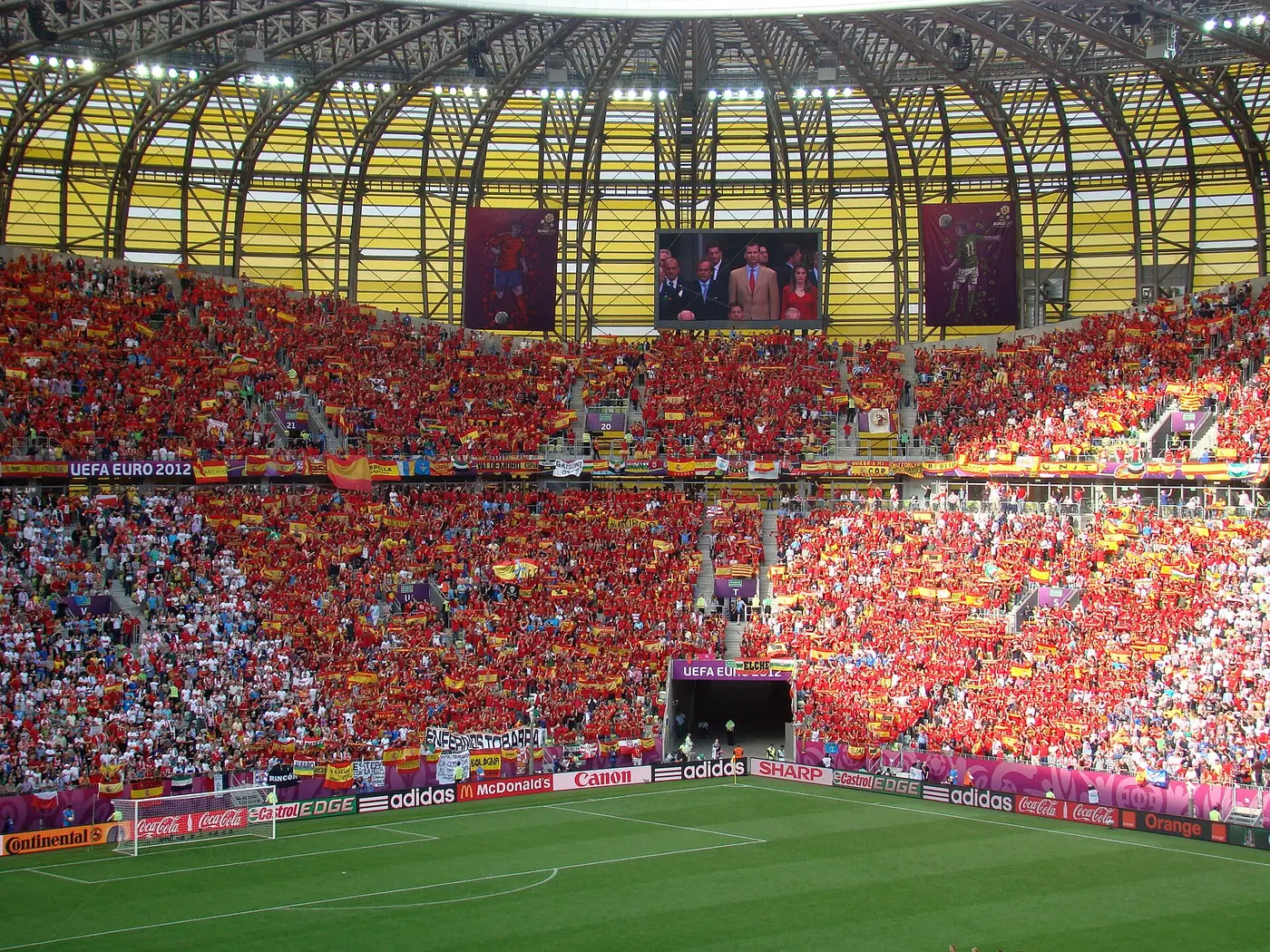 Spain supporters in red wave flags in a packed stadium as Spain beat Belgium 2-1 in the World Cup 2026 quarter-final at SoFi Stadium on July 10